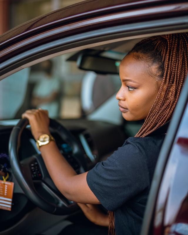 portrait image of a women driving