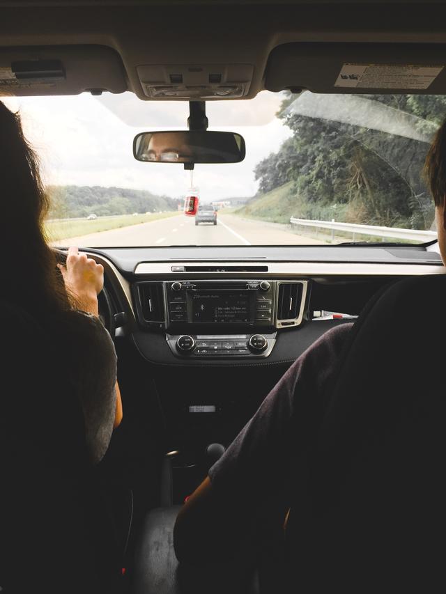 portrait image of a women driving